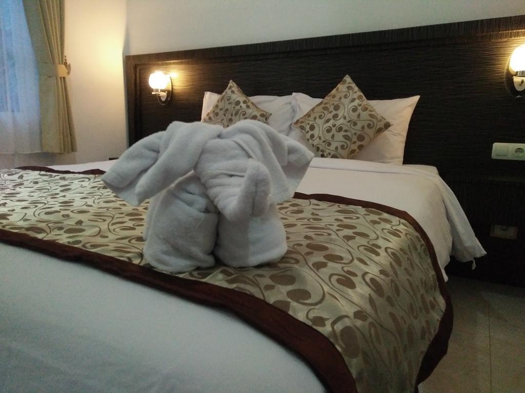 Asta House Hotel Кута Екстериор снимка